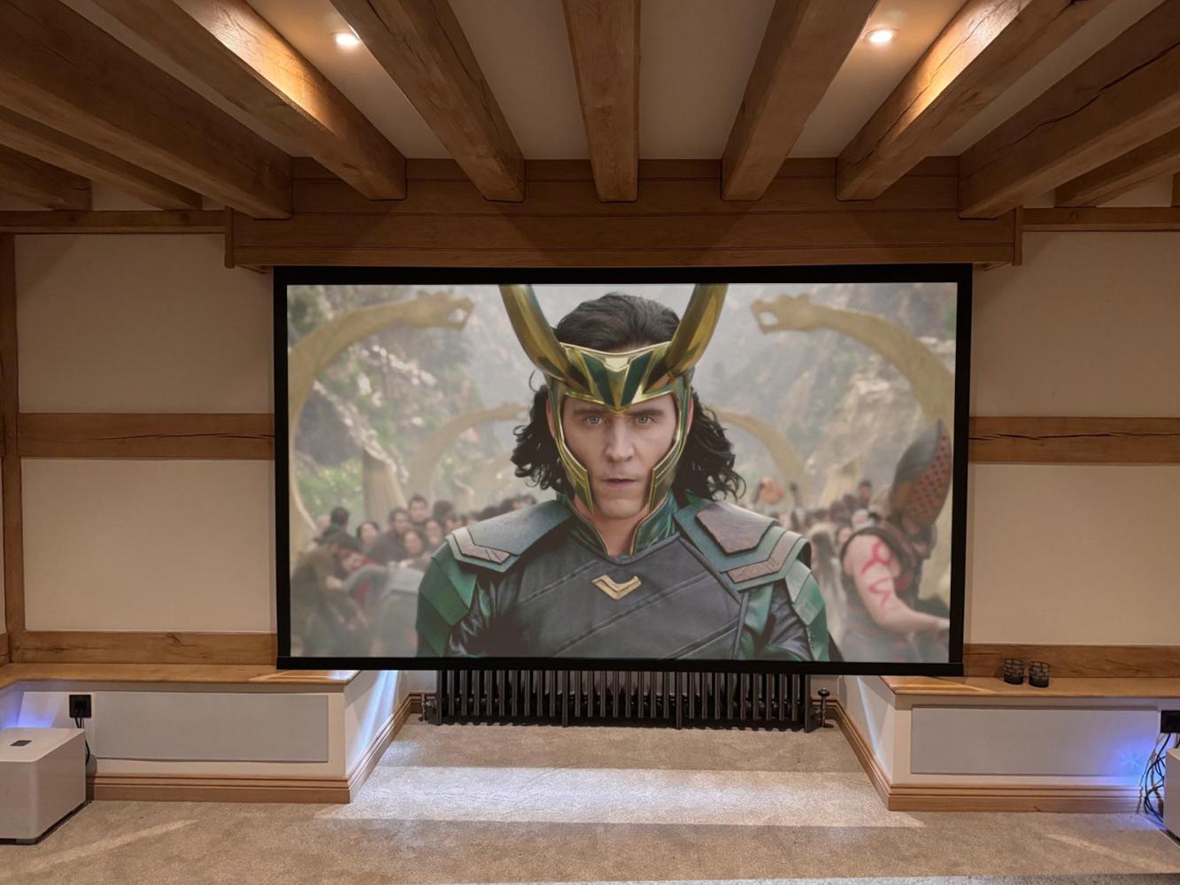 Projector screen in oak beamed room