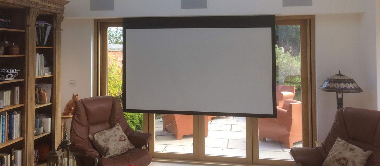 projector screen in front of bifold doors