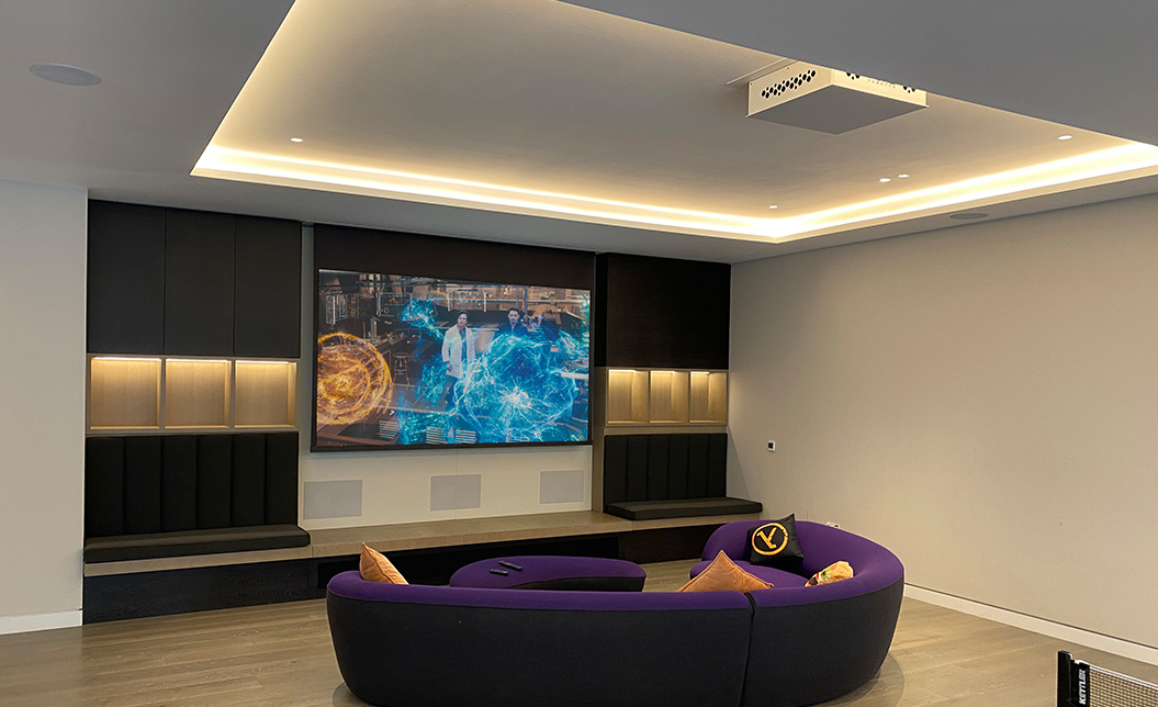 Media Wall with concealed cinema in games room
