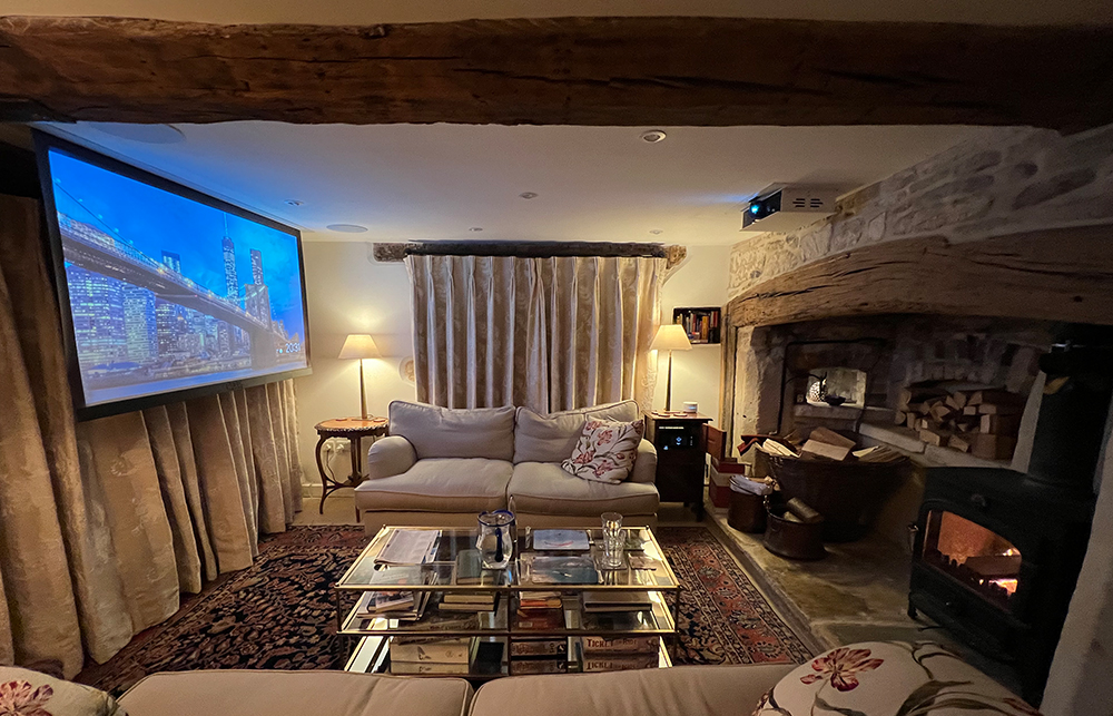 period property with beams and projector screen