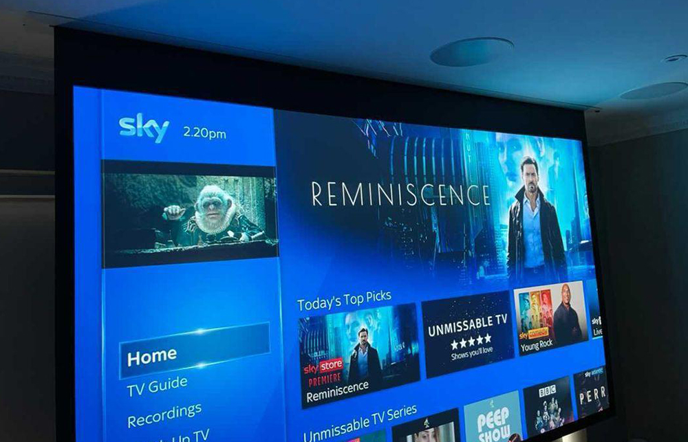 projector screen showing sky in living room